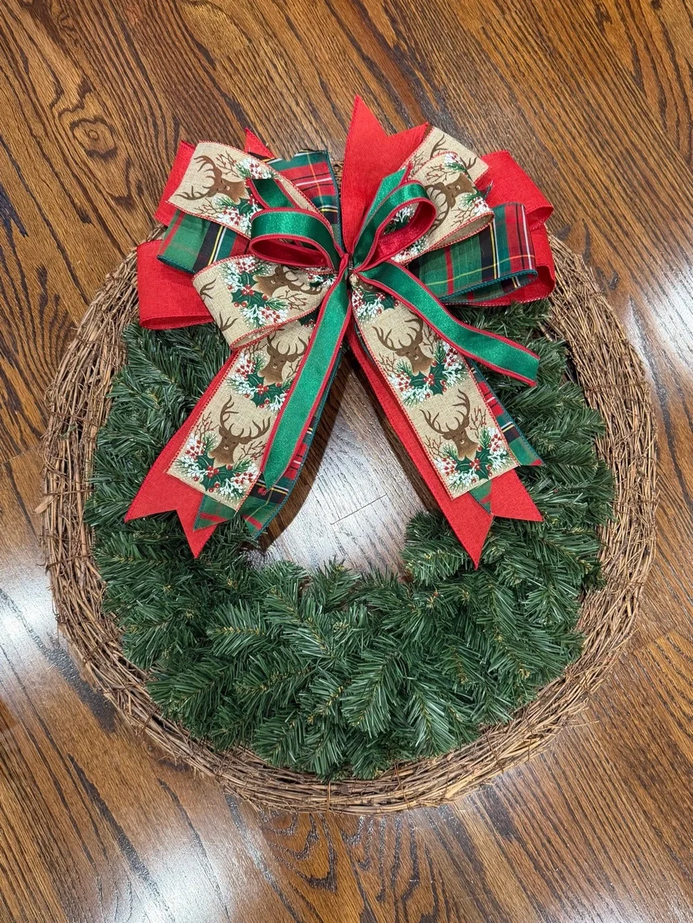 Festive Green Holiday Wreath with Red & Green Reindeer Bow